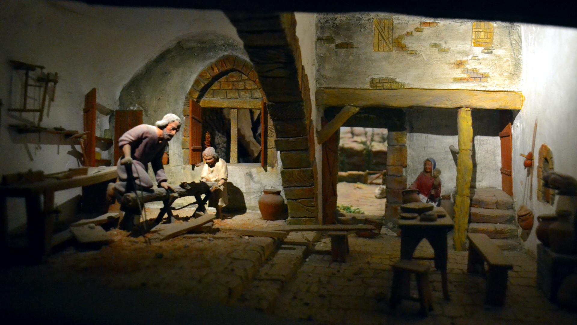 Crèche de l'Abbaye d'Hauterive, la Sainte Famille dans l'atelier de Nazareth (Photo: Georges Scherrer 2015) 