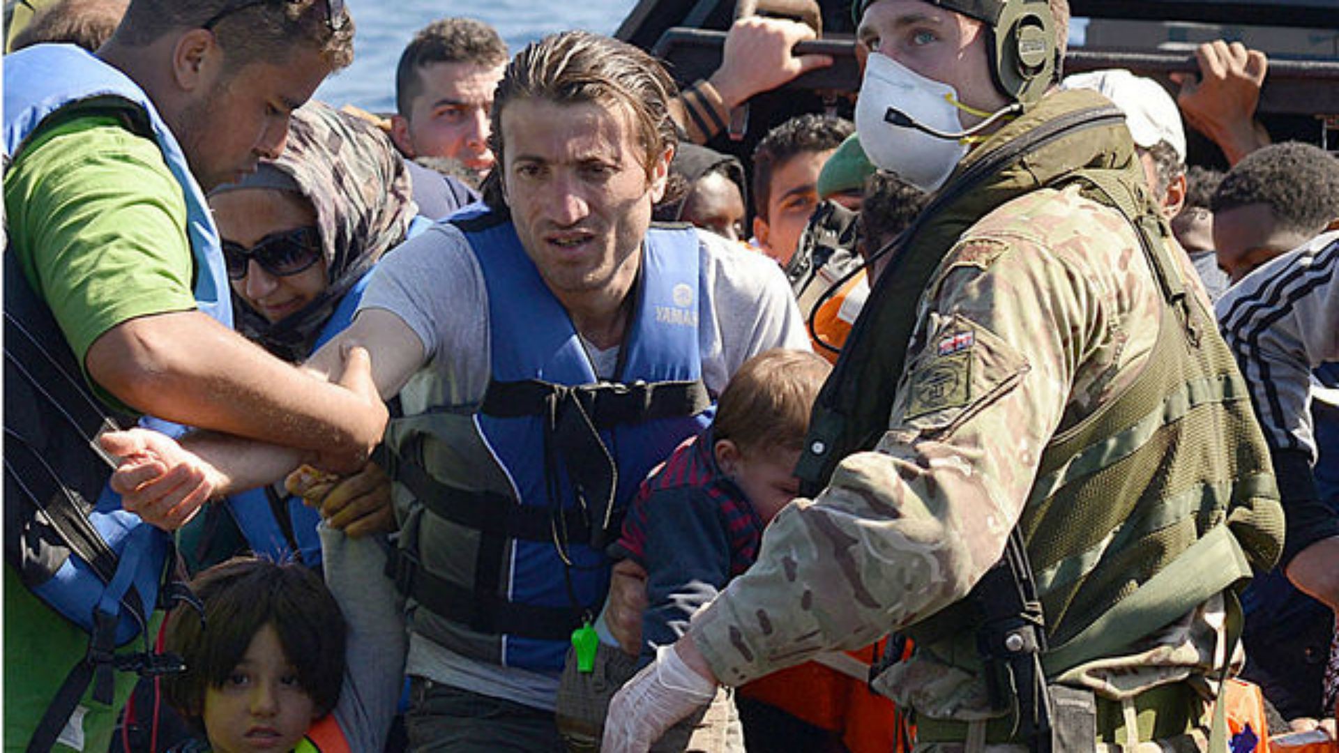 Réfugiés arrivant sur les côtes italiennes. (photo: Flickr/rn_topten/CC BY-NC 2.0)
