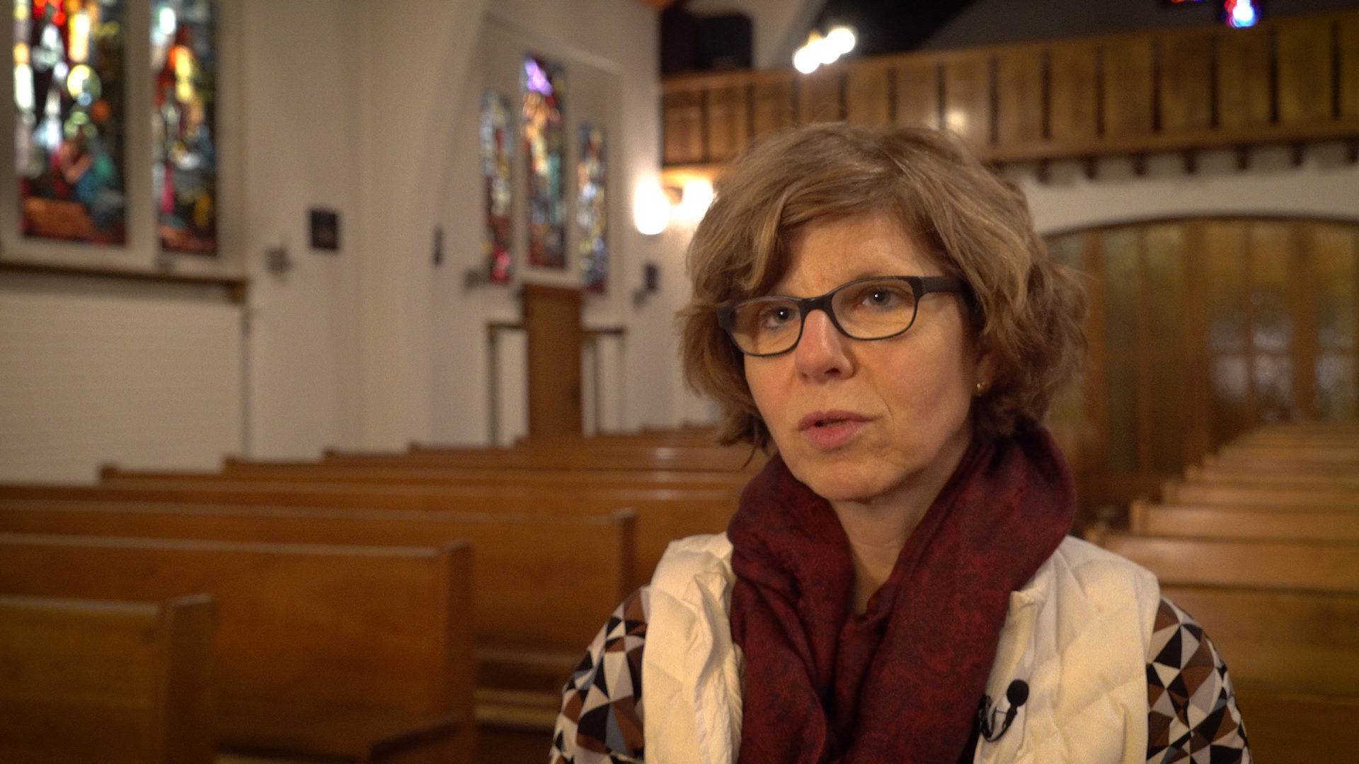 Catherine Menoud est assistante pastorale à Genève. C'est dans la petite église de Plan-les-Ouates qu'elle vient puiser la force nécessaire à son engagement | © Pierre Pistoletti