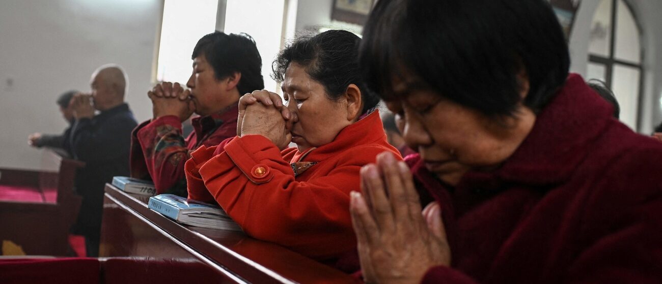 Difficile de savoir comment les catholiques chinois voient l'accord Chine-Vatican | © KEYSTONE/AFP/JADE GAO