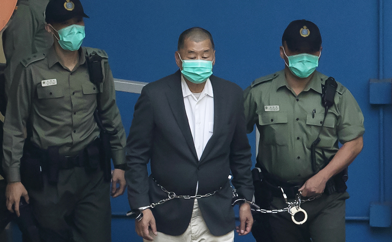 Jimmy Lai, lors de son arrestation le 12 décembre 2020 | © Keystone / AP / Kin Cheung